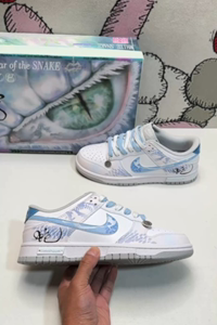 Nike Dunk Low SB sneakers with gift box packaging