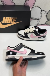 Nike Dunk Low SB sneakers with butterfly pattern