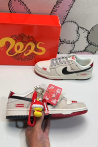 Nike Dunk Low SB sneakers with SUP logo