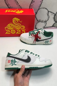 Nike Dunk Low SB sneakers with dragon pattern