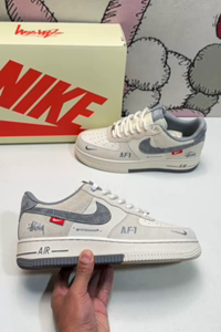 Air Force 1 low-cut shoes grey white Stussy embroidery