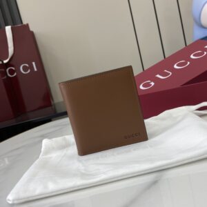 Brown leather double-fold wallet with GG cross pattern