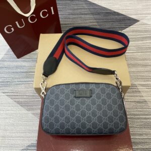 Crossbody bag with red blue stripe fabric