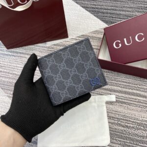 Men's wallet with GG Supreme fabric and blue accents