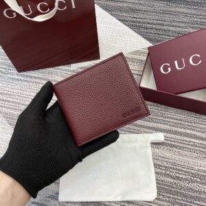 Red bifold wallet with Gucci logo