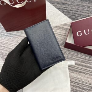 Light blue bifold wallet with Gucci logo