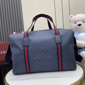 Travel bag deep blue GG Supreme fabric